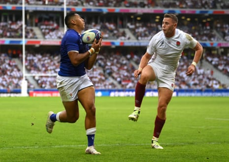 Nigel Ah-Wong of Samoa catches the ball after it sailed over Freddie Steward of England before going on to score his second try of the game.