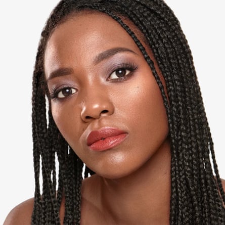 Model wears Wonderskin lip stain in Crush