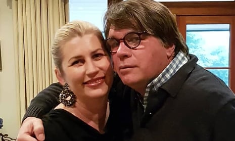 Donna Andrews and John Grono in 2019 in their house that burnt down in 2020