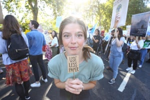 A protester in London shows her solution to the climate emergency.