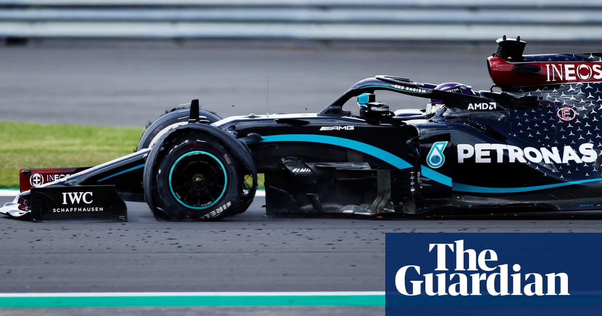 Lewis Hamilton hangs on to win British Grand Prix after puncture drama
