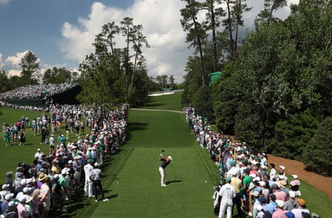 Rory McIlroy of Northern Ireland plays his shot from the 18th tee on his way to a spellbinding 66 in the second round at Augusta.