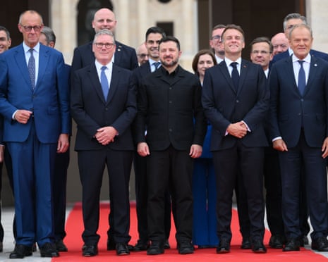 The leaders of Germany, Britain, Ukraine. France and Poland with other leaders around them