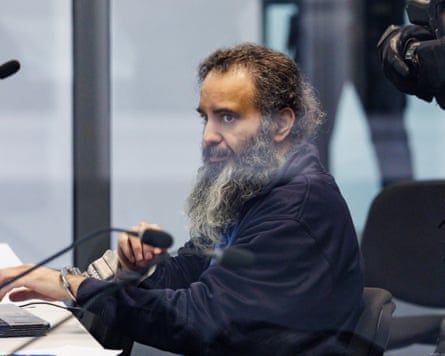 Taleb al-Abdulmohsen sits in the dock on the first day of his trial