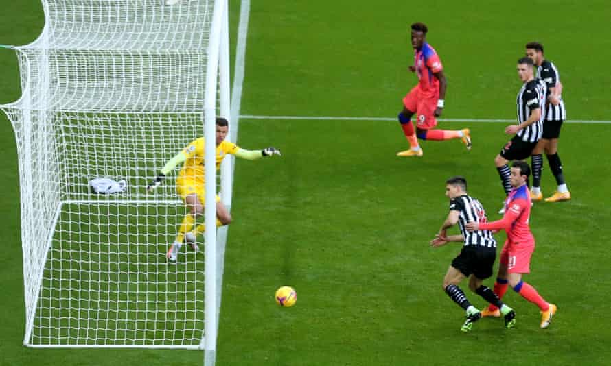 Newcastle’s Federico Fernández scores an own goal to give Chelsea an early lead