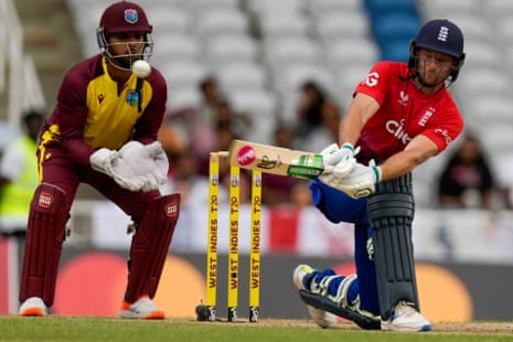 England's captain Jos Buttler plays a shot.