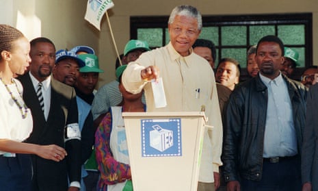 Nelson Mandela casts his vote in South Africa’s first all-race election,  Oshlange, black township near Durban, 27 April 1994.