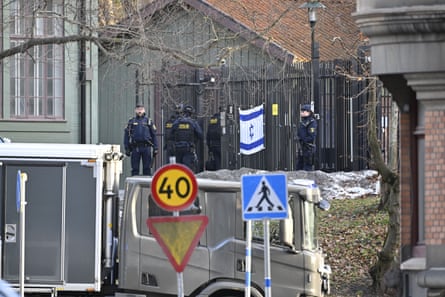 Police stationed outside the Israeli embassy in Stockholm.