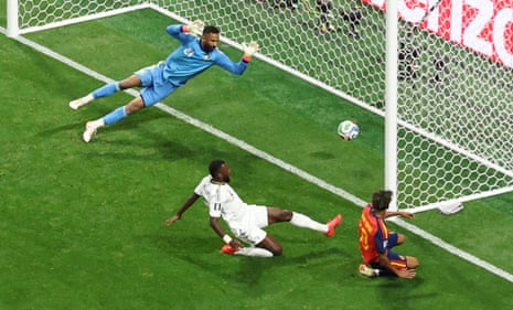 Lamine Yamal #19 of Spain scores his team's first goal