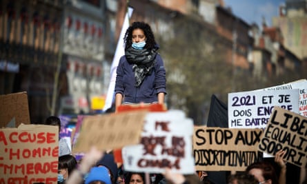 Women protest violence against women during a march in Toulouse, France.