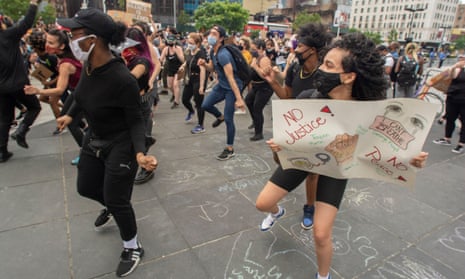 People do the Electric Slide at a Dance for George protest in New York on 7 June.