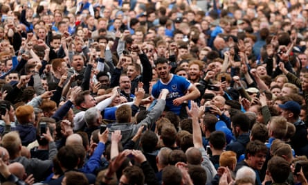 Portsmouth’s Conor Chaplin celebrates with the fans after the club secured promotion to League One last month.