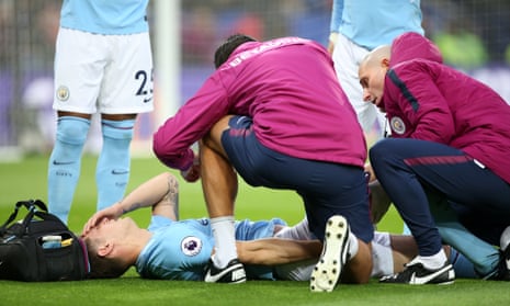 John Stones receives treatment before being substituted at Leicester on Saturday. The England defender is unlikely to play again before the new year.
