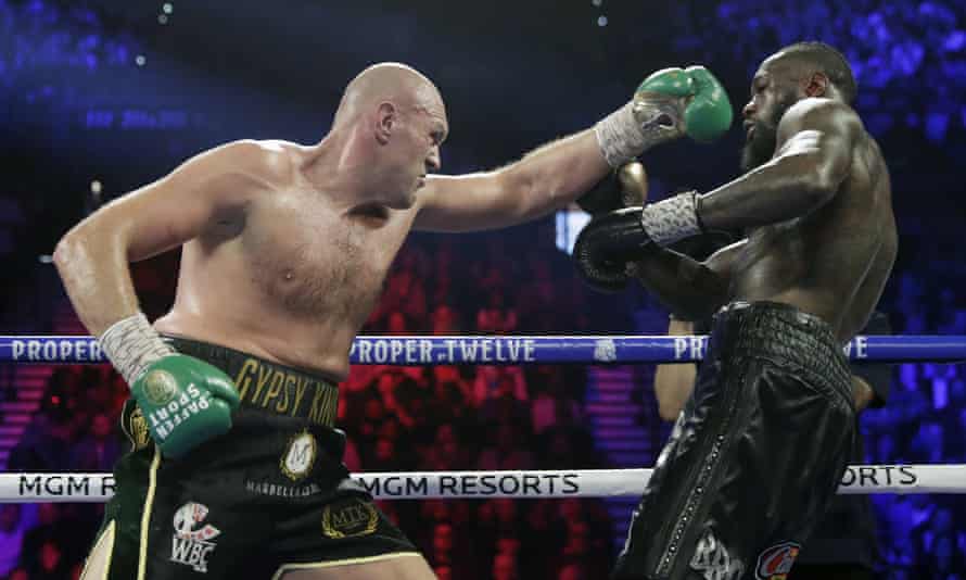 Tyson Fury throws a left at Deontay Wilder when they fought in February 2020