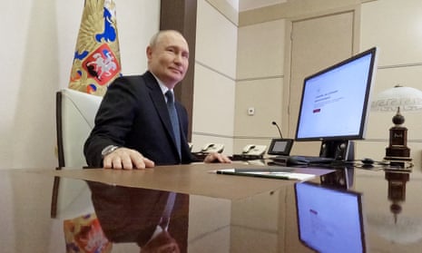 Vladimir Putin votes online in the presidential election in a residence outside Moscow.