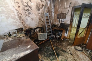 A damaged room inside the mayor’s office building in Almaty. Other government buildings were reportedly also stormed.