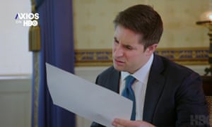 Jonathan Swan puzzles over papers in his interview with Trump.
