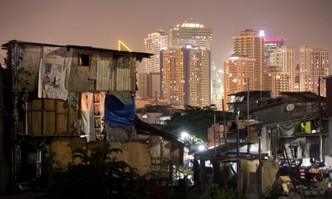 Manila’s financial district, seen from a slum area. 
