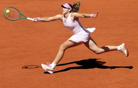 A running Mirra Andreeva stretches to make a return to Maja Chwalinska.