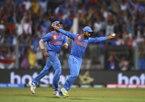 Rahane celebrates after taking a catch to dismiss Samuels.