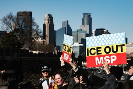 people holding signs