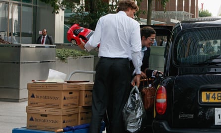 Employees of Lehman Brothers in Canary Wharf, London, after its collapse in 2008.