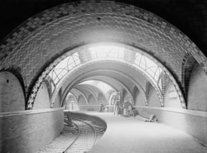 A black and white photo showing a subterranean shot of Lexington Avenue