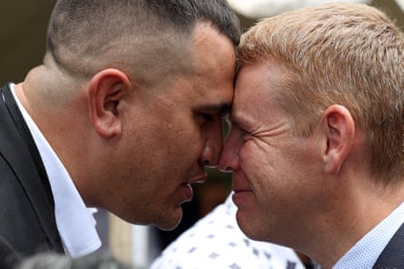 New Zealand prime minister Chris Hipkins (right) greets with a hongi in Waitangi on Sunday.