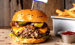 The $12 Impossible Burger ‘bleeds’ – just like the real thing. It’s hoped non-meat alternatives will cut down on beef and help America reduce its emissions.
