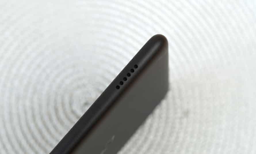 The speaker grille in the top edge of the Fire 7 tablet.