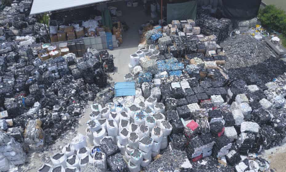 E-waste is piled high at a dump site in Samut Prakan province, south of Bangkok.