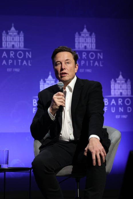 Elon Musk speaks on Friday at the Baron investment conference in Manhattan.