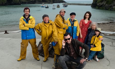 Daniel Mays, centre front, and Tuppence Middleton, third from right, in Fisherman’s Friends.