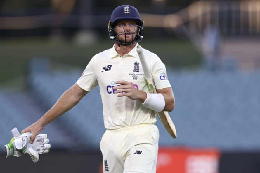 Jos Buttler leaves the field after being fired, hitting the wicket, during the fifth day of the Adelaide Test.