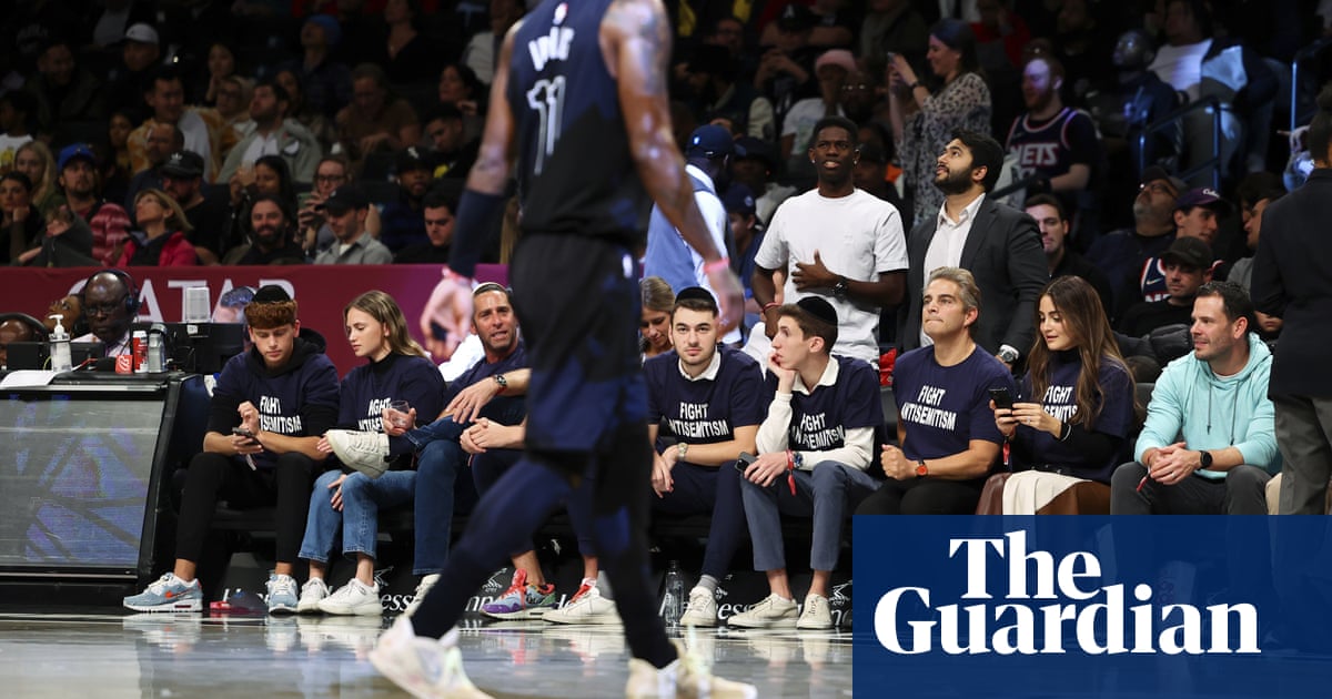 Fans wear ‘Fight antisemitism’ shirts directed at Kyrie Irving amid furor – The Guardian
