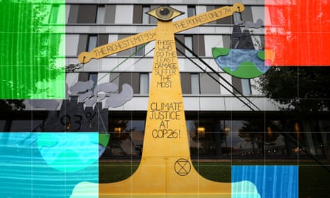 Climate justice scales sculpture