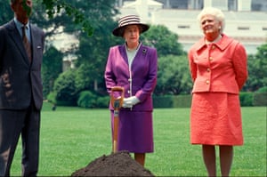 The Queen and Barbara Bush listen as George HW Bush speaks during a tree planting ceremony on the South Lawn of the White House on 14 May 1991