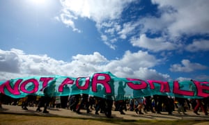 Anti-fracking campaigners marching up Blackpool promenade in Lancashire