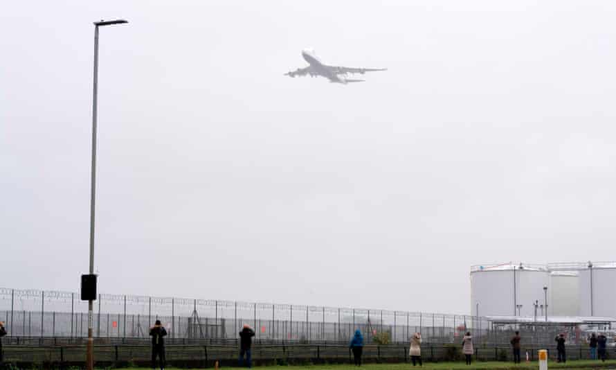 A British Airways Boeing 747 aircraft makes a flypast over London Heathrow airport