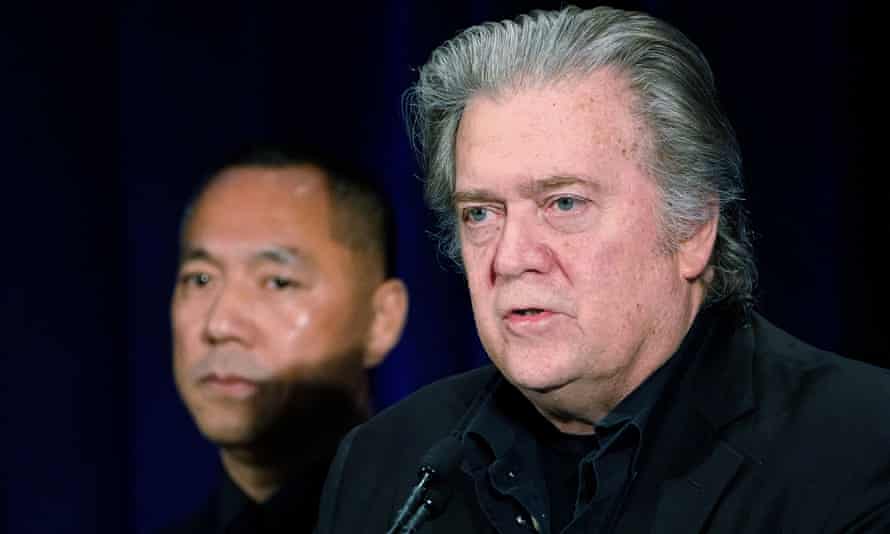 Steve Bannon and Guo Wengui (also known as Miles Kwok) appear at a news conference in New York in 2018.