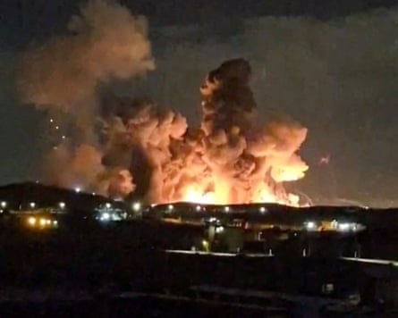 Smoke and fire rise after an explosion