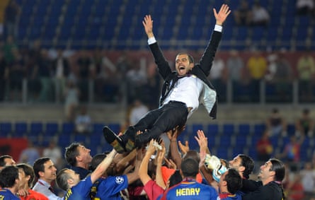 Barcelona players throw Pep Guardiola in the air after beating Manchester United in the 2009 Champions League final