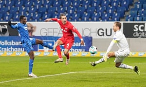 Yussuf Poulsen scores the winner for Leipzig at Hoffenheim.