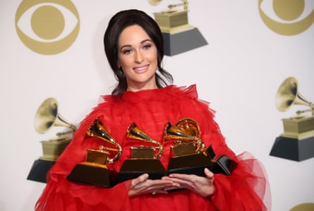 Kacey Musgraves poses in the press room with her awards for Best Country Solo Performance for ‘Butterflies,’ Best Country Song for ‘Space Cowboy,’ Best Country Album for ‘Golden Hour,’ and Album of The Year for ‘Golden Hour,’ during the 61st Annual GRAMMY Awards at the Staples Center on February 10, 2019 in Los Angeles, California