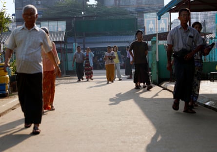 People arrive to vote in Yangon