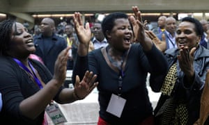 Delegates celebrate after Robert Mugabe’s dismissal as Zanu-PF leader