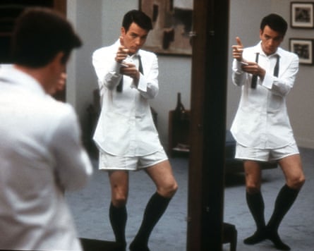 Catcher Block dresses in front of mirrors