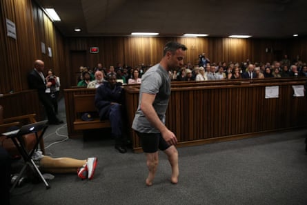The Paralympic gold medalist Oscar Pistorius walks across the courtroom without his prosthetic legs during the third day of the re-sentencing hearing for the 2013 murder of his girlfriend Reeva Steenkamp, at Pretoria high court, South Africa. 15 June 2016.