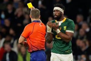 Siya Kolisi of South Africa is yellow carded for a tackle on Joe Marchant of England.