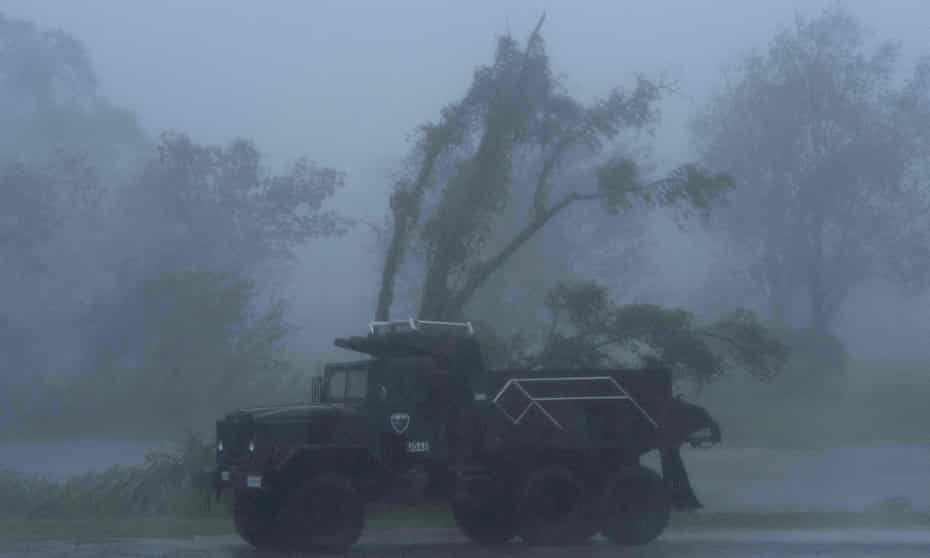 A truck is seen in heavy winds and rain from Hurricane Ida in Bourg, Louisiana.